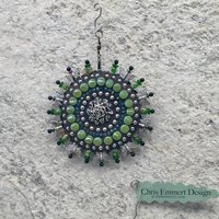 Green  Roses garden spinner. Chris Emmert mosaic art.