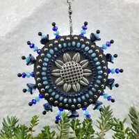 mosaic wind spinner in blues by chris emmert