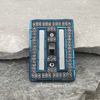 Mirror and Pewter Switch Plate, Iridescent Blue