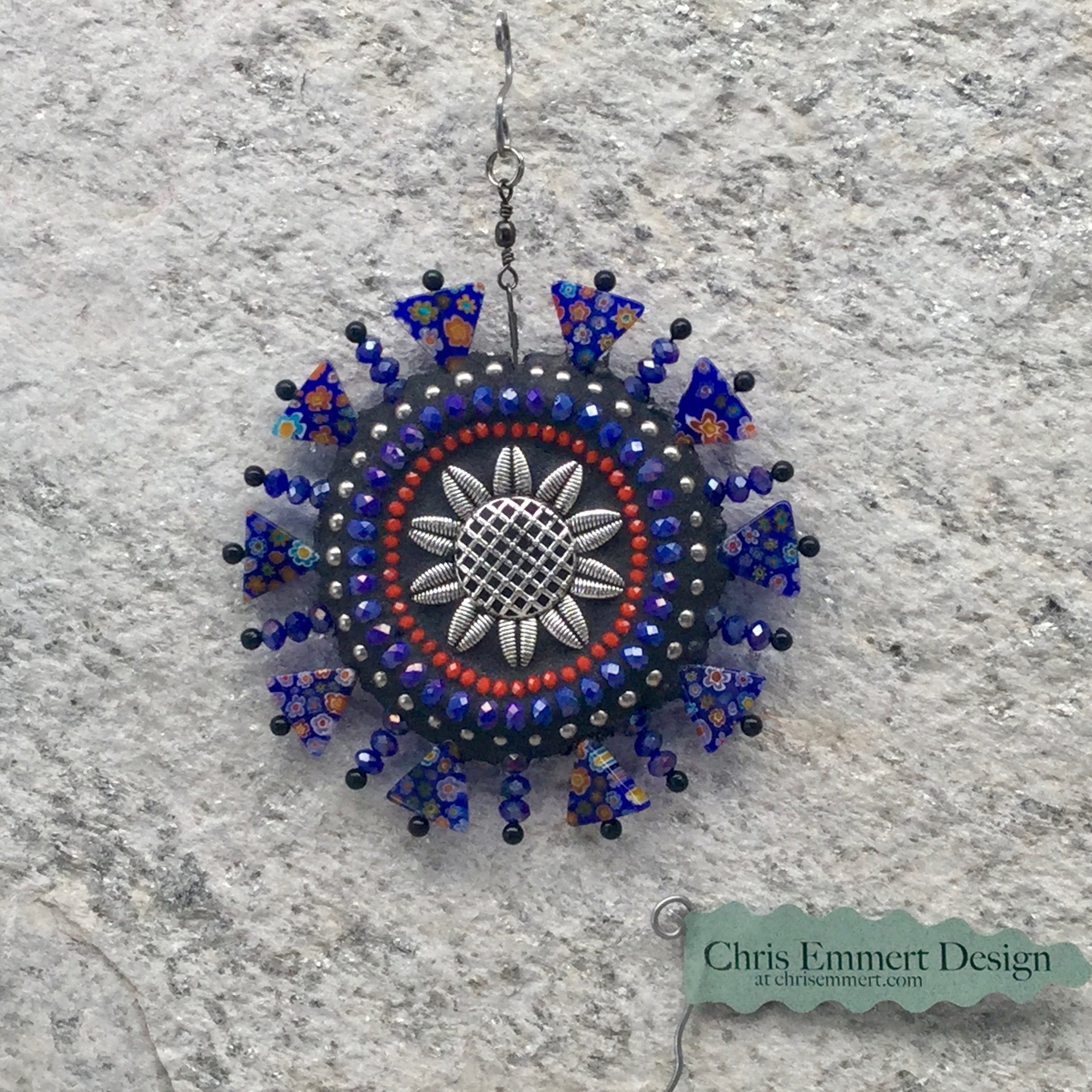Blue sunflower garden spinner.  Chris Emmert mosaic.