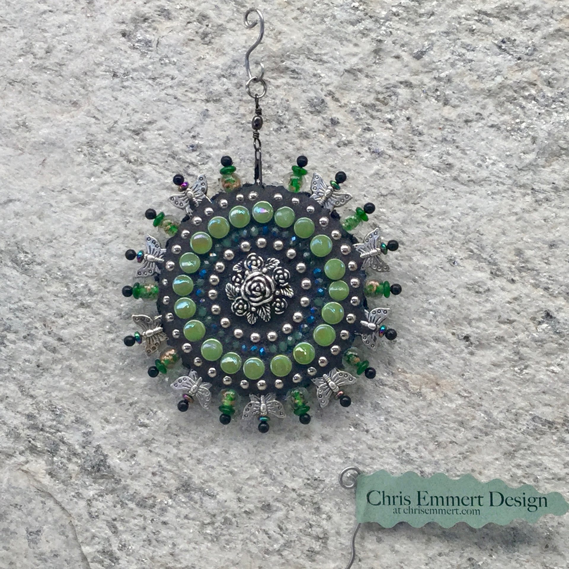 Green  Roses garden spinner. Chris Emmert mosaic art.