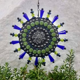 mosaic wind spinner in blues by chris emmert