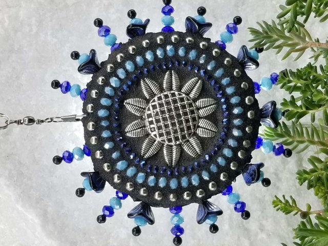 mosaic wind spinner in blues by chris emmert