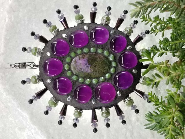 gemstone, mosaic garden wind spinner in purples by chris emmert